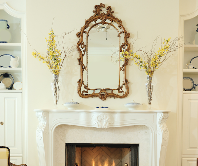 Add a mirror over the fireplace to boost natural light.